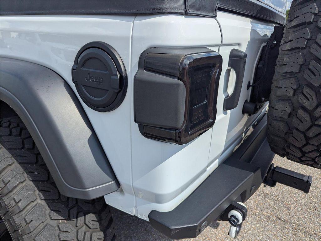 used 2023 Jeep Wrangler car, priced at $28,299