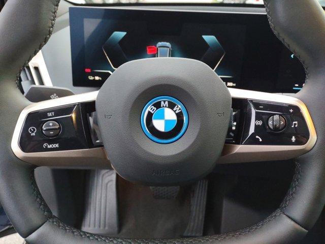 new 2024 BMW iX car, priced at $92,595