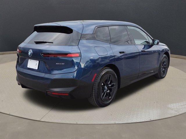 new 2024 BMW iX car, priced at $92,595
