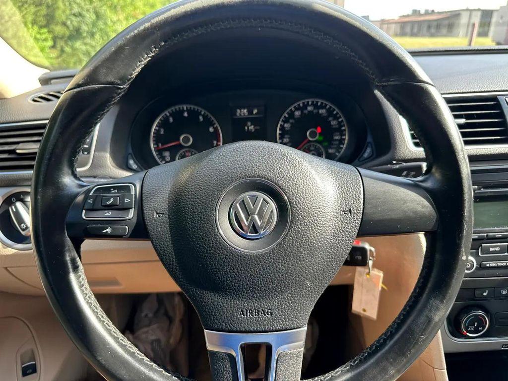 used 2014 Volkswagen Passat car, priced at $7,995