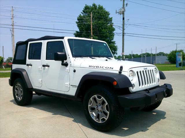 used 2014 Jeep Wrangler Unlimited car, priced at $14,995