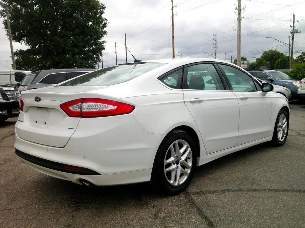 used 2016 Ford Fusion car, priced at $9,995