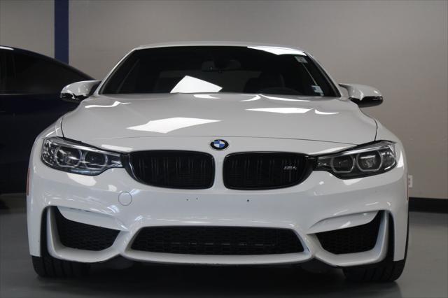 used 2018 BMW M4 car, priced at $44,800