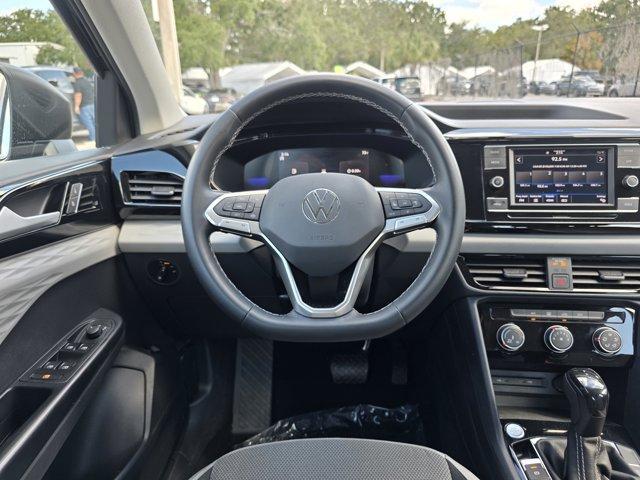 used 2023 Volkswagen Taos car, priced at $17,493