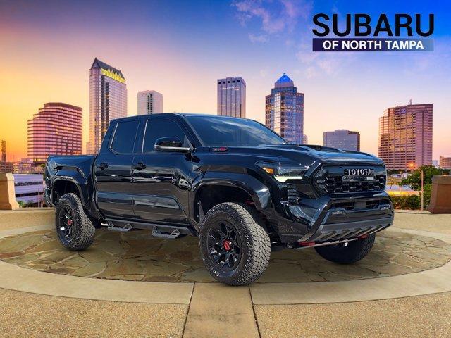 used 2025 Toyota Tacoma Hybrid car, priced at $61,891