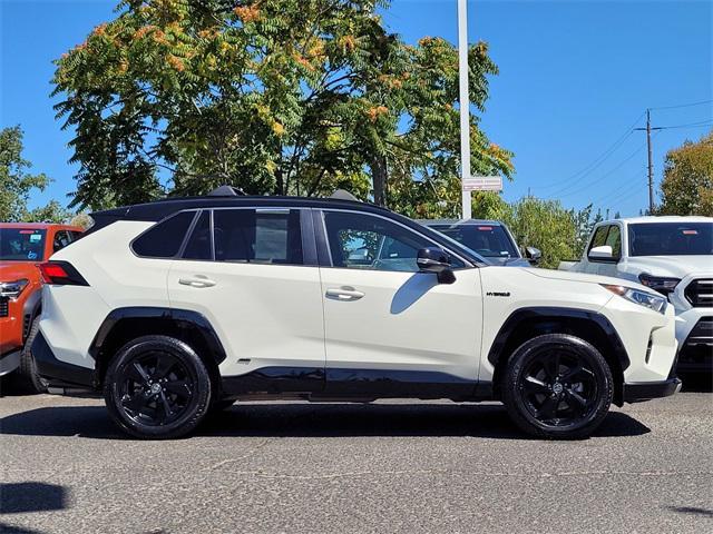 used 2021 Toyota RAV4 Hybrid car, priced at $31,947