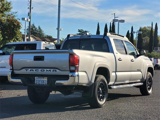 used 2022 Toyota Tacoma car, priced at $30,215