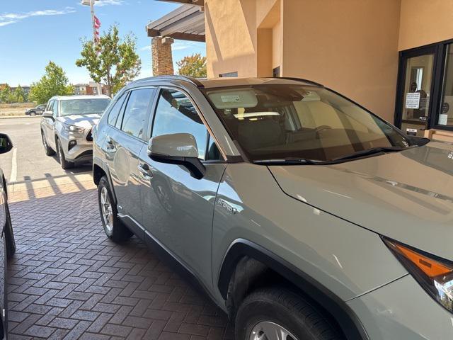 used 2021 Toyota RAV4 Hybrid car, priced at $28,016