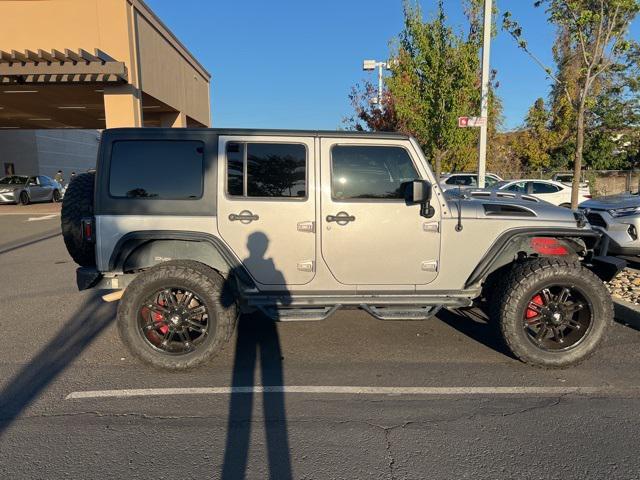 used 2015 Jeep Wrangler Unlimited car, priced at $20,016