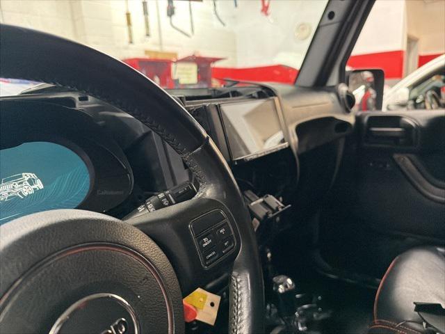 used 2015 Jeep Wrangler Unlimited car, priced at $20,016