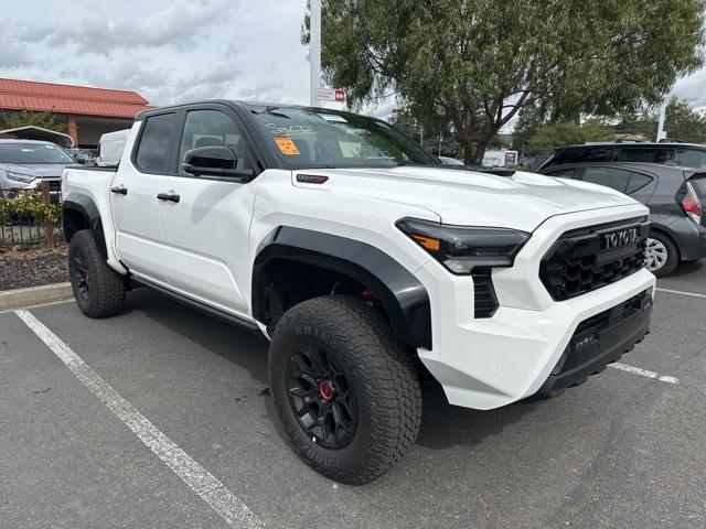 used 2024 Toyota Tacoma car, priced at $77,351