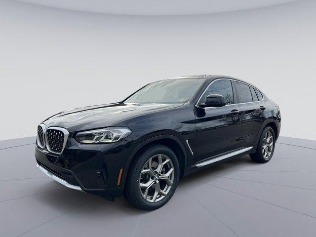 used 2024 BMW X4 car, priced at $49,827