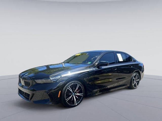 used 2025 BMW 550e car, priced at $66,923