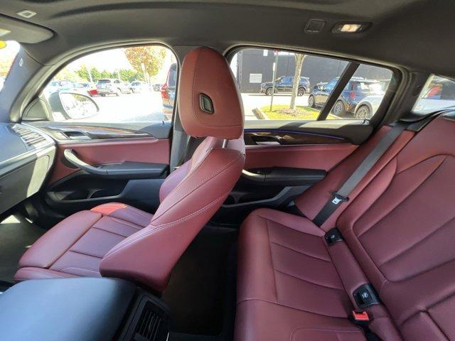 used 2023 BMW X4 car, priced at $44,697