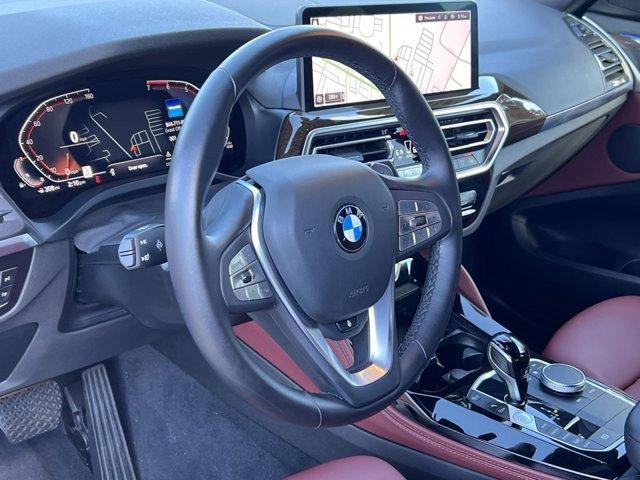 used 2023 BMW X4 car, priced at $44,697