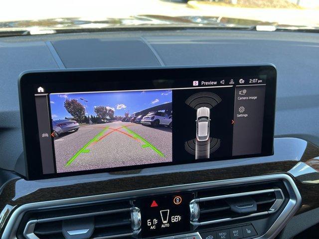 used 2023 BMW X4 car, priced at $44,697