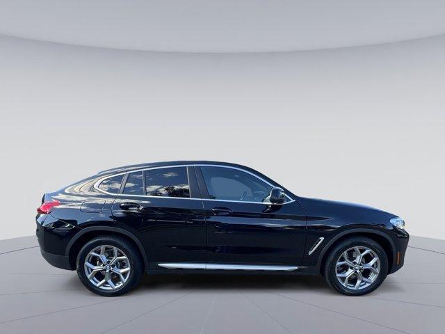 used 2023 BMW X4 car, priced at $44,697