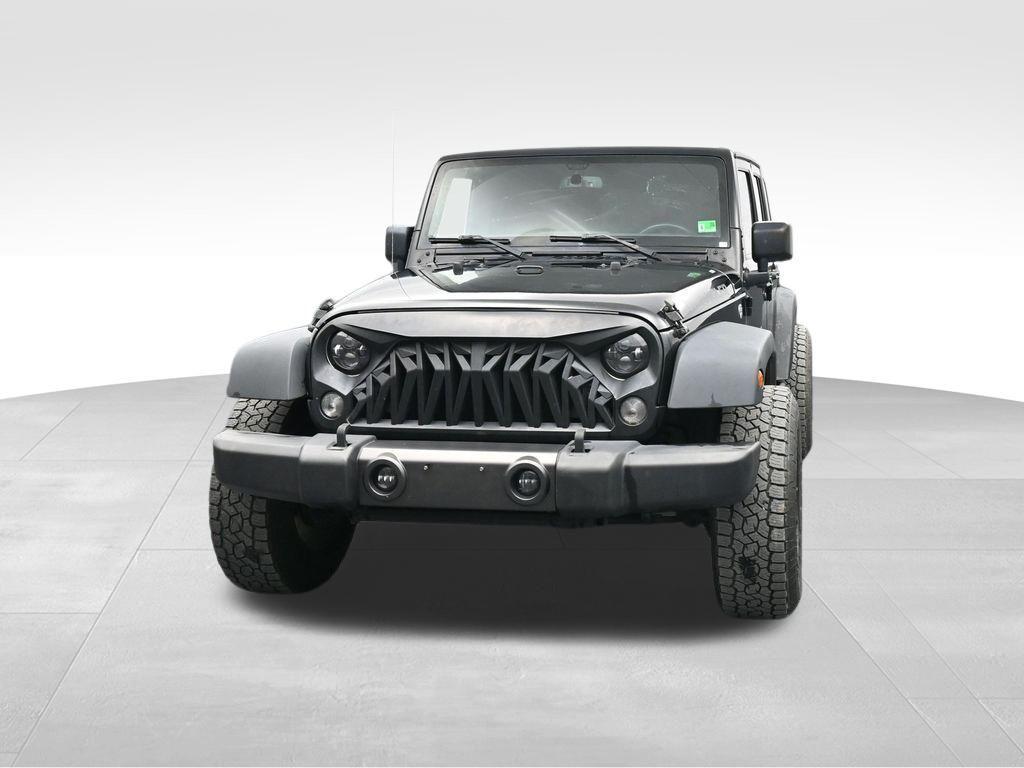 used 2016 Jeep Wrangler Unlimited car, priced at $16,373