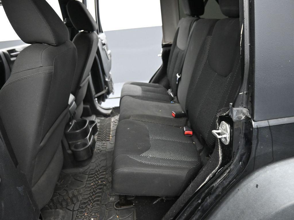 used 2016 Jeep Wrangler Unlimited car, priced at $16,373