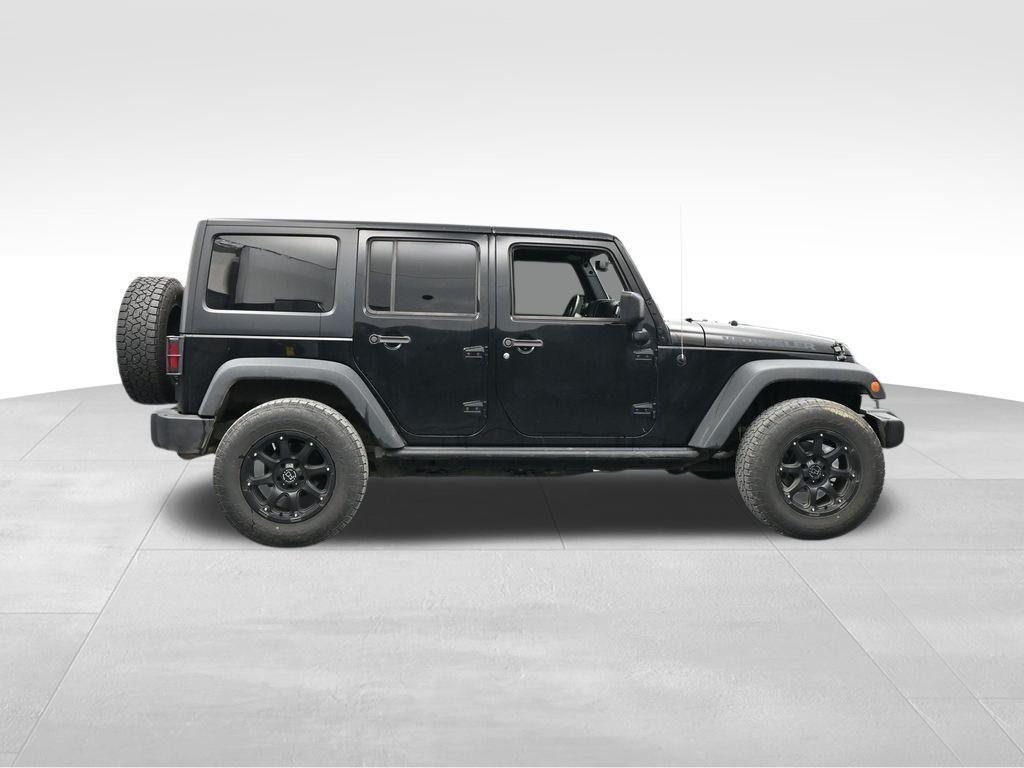 used 2016 Jeep Wrangler Unlimited car, priced at $16,373