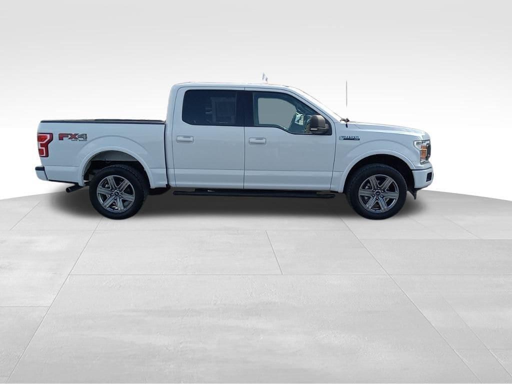 used 2019 Ford F-150 car, priced at $25,673