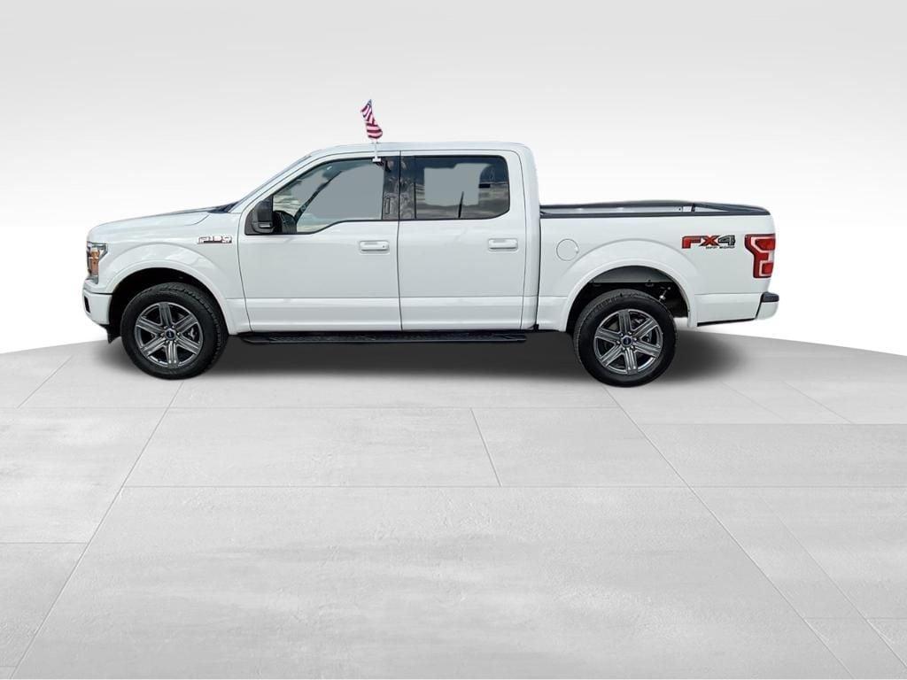 used 2019 Ford F-150 car, priced at $25,673