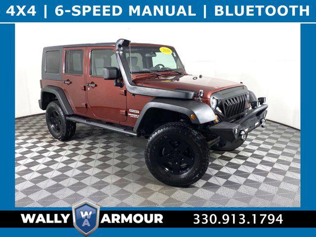 used 2010 Jeep Wrangler Unlimited car, priced at $9,988