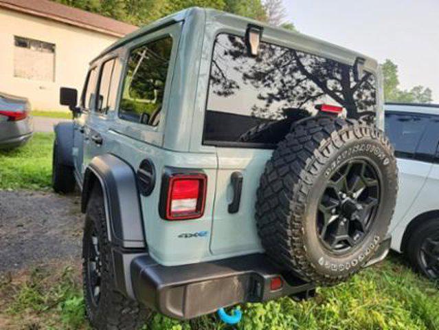 used 2023 Jeep Wrangler 4xe car, priced at $33,100