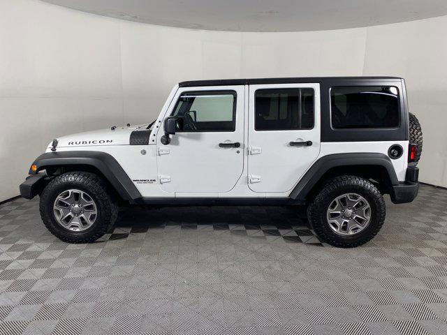 used 2014 Jeep Wrangler Unlimited car, priced at $16,500