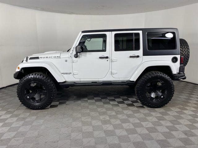 used 2013 Jeep Wrangler Unlimited car, priced at $19,900