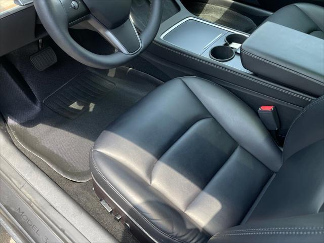 used 2023 Tesla Model 3 car, priced at $27,199