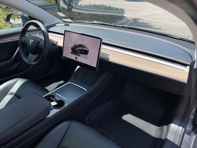 used 2023 Tesla Model 3 car, priced at $27,199