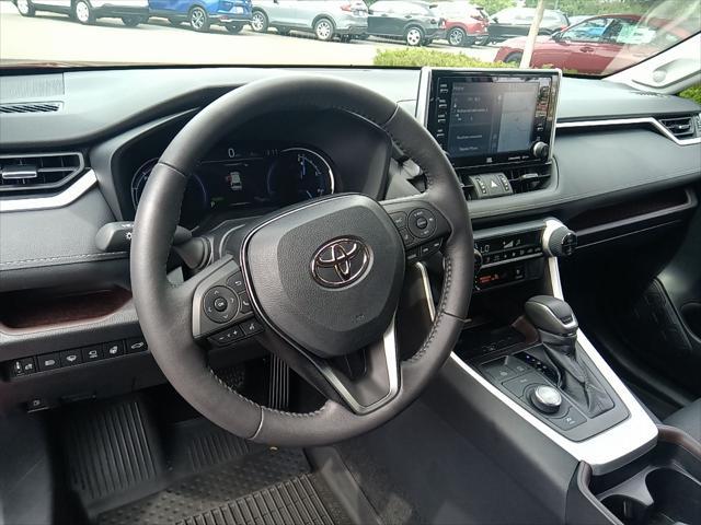 used 2021 Toyota RAV4 Hybrid car, priced at $38,599