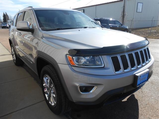 used 2014 Jeep Grand Cherokee car, priced at $17,651