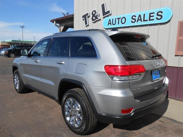 used 2014 Jeep Grand Cherokee car, priced at $17,651