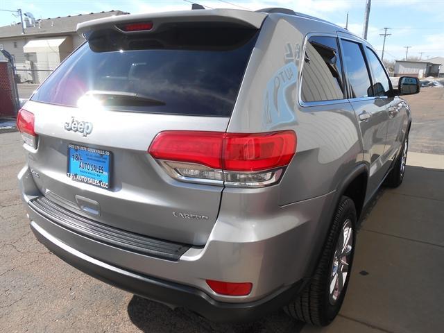 used 2014 Jeep Grand Cherokee car, priced at $17,651