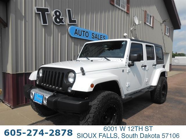 used 2014 Jeep Wrangler Unlimited car, priced at $27,351