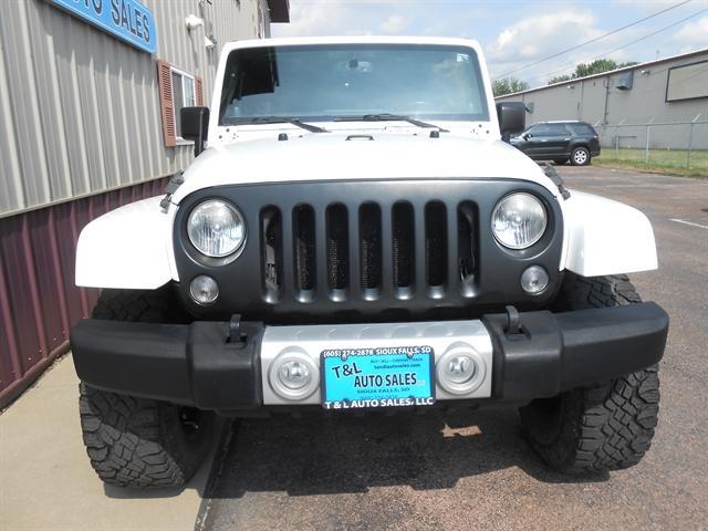 used 2014 Jeep Wrangler Unlimited car, priced at $27,351