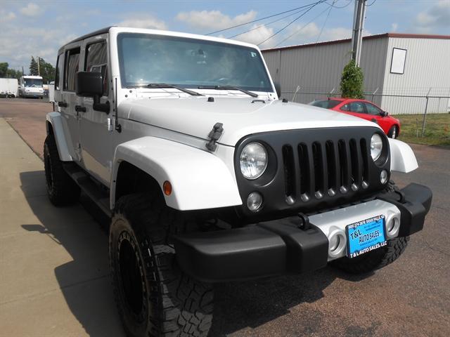 used 2014 Jeep Wrangler Unlimited car, priced at $27,351