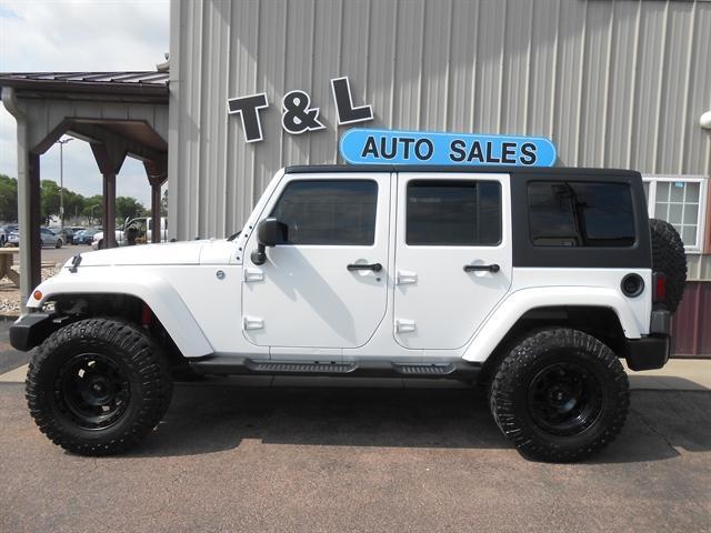 used 2014 Jeep Wrangler Unlimited car, priced at $27,351