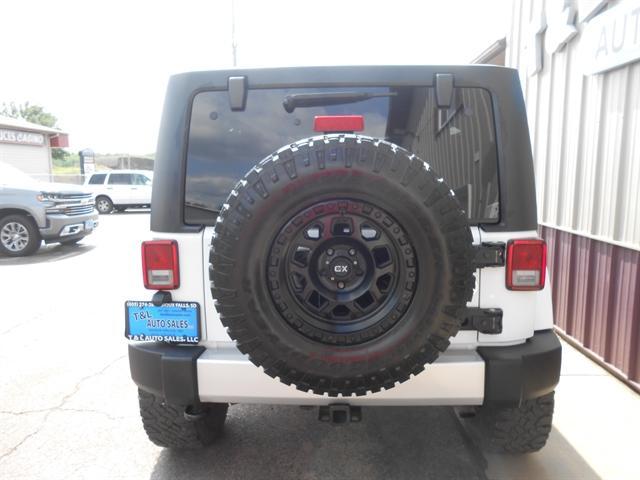 used 2014 Jeep Wrangler Unlimited car, priced at $27,351