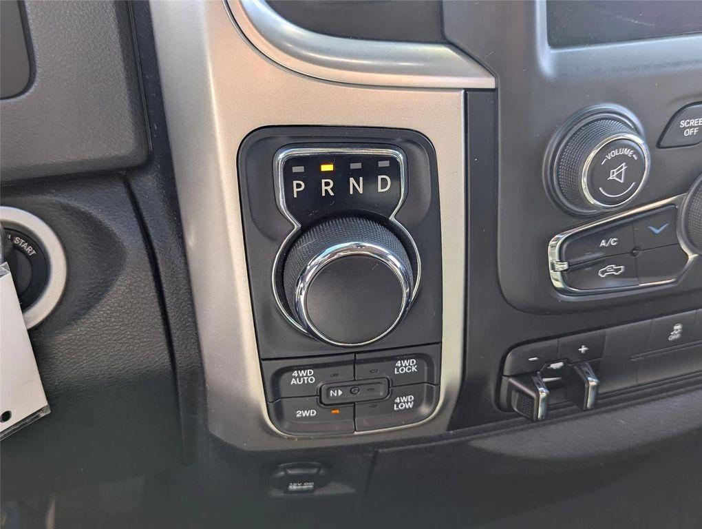 used 2018 Ram 1500 car, priced at $23,999