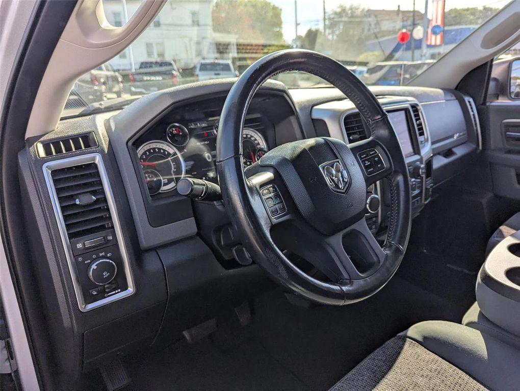 used 2018 Ram 1500 car, priced at $23,999