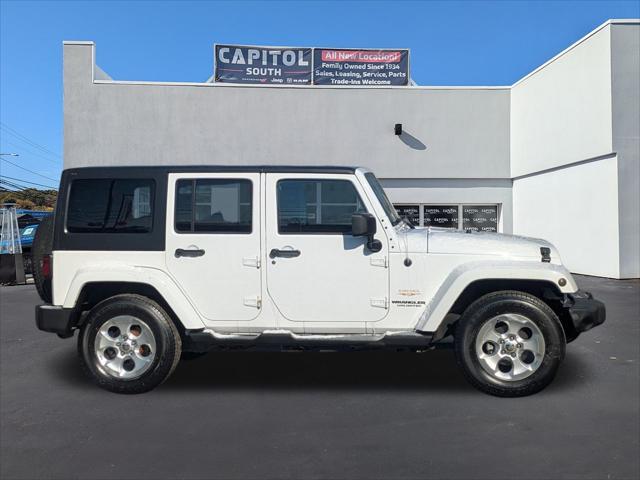 used 2013 Jeep Wrangler Unlimited car, priced at $17,868