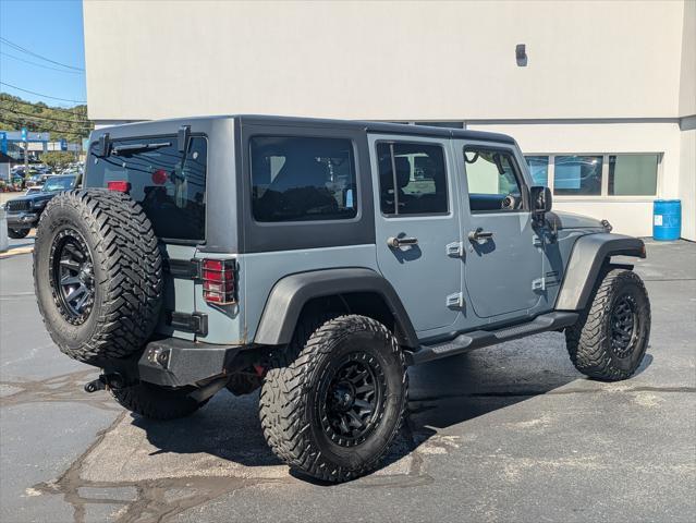 used 2015 Jeep Wrangler Unlimited car, priced at $16,957