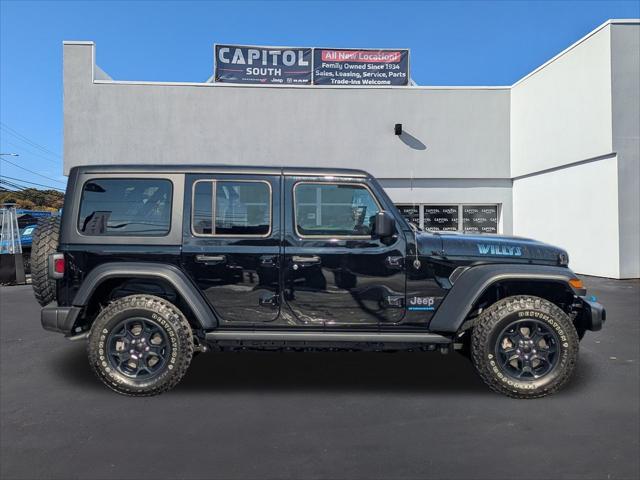 used 2023 Jeep Wrangler 4xe car, priced at $34,897