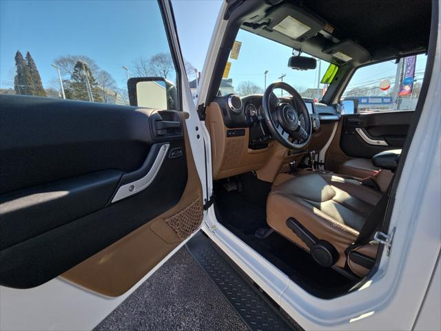 used 2014 Jeep Wrangler Unlimited car, priced at $24,884