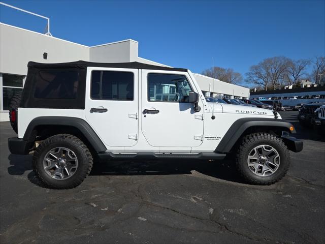 used 2014 Jeep Wrangler Unlimited car, priced at $24,884