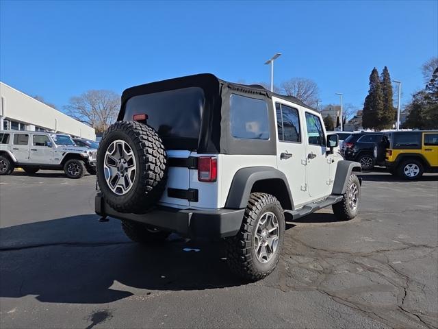 used 2014 Jeep Wrangler Unlimited car, priced at $24,884