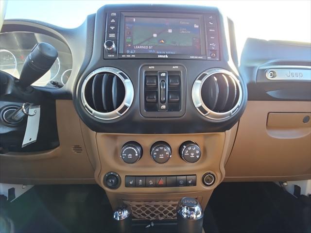 used 2014 Jeep Wrangler Unlimited car, priced at $24,884